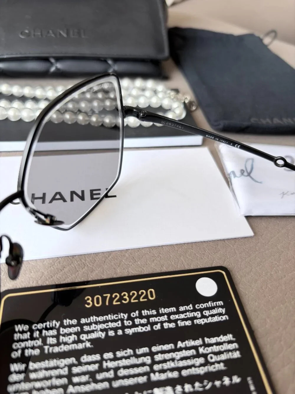 Chanel Butterfly Sunglasses featuring a removable pearl chain